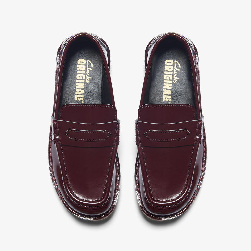 Nomad Loafer Verni rouge brique