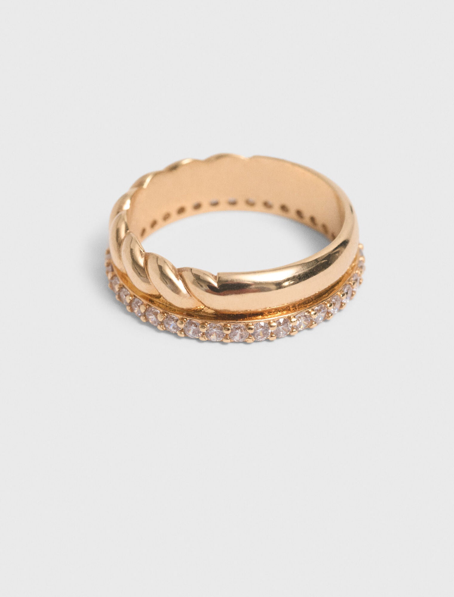 Bague dorée torsadée et strassée