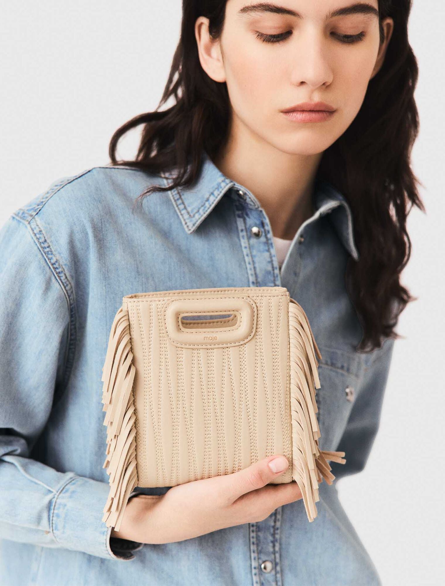 Sac M mini en cuir surpiqué